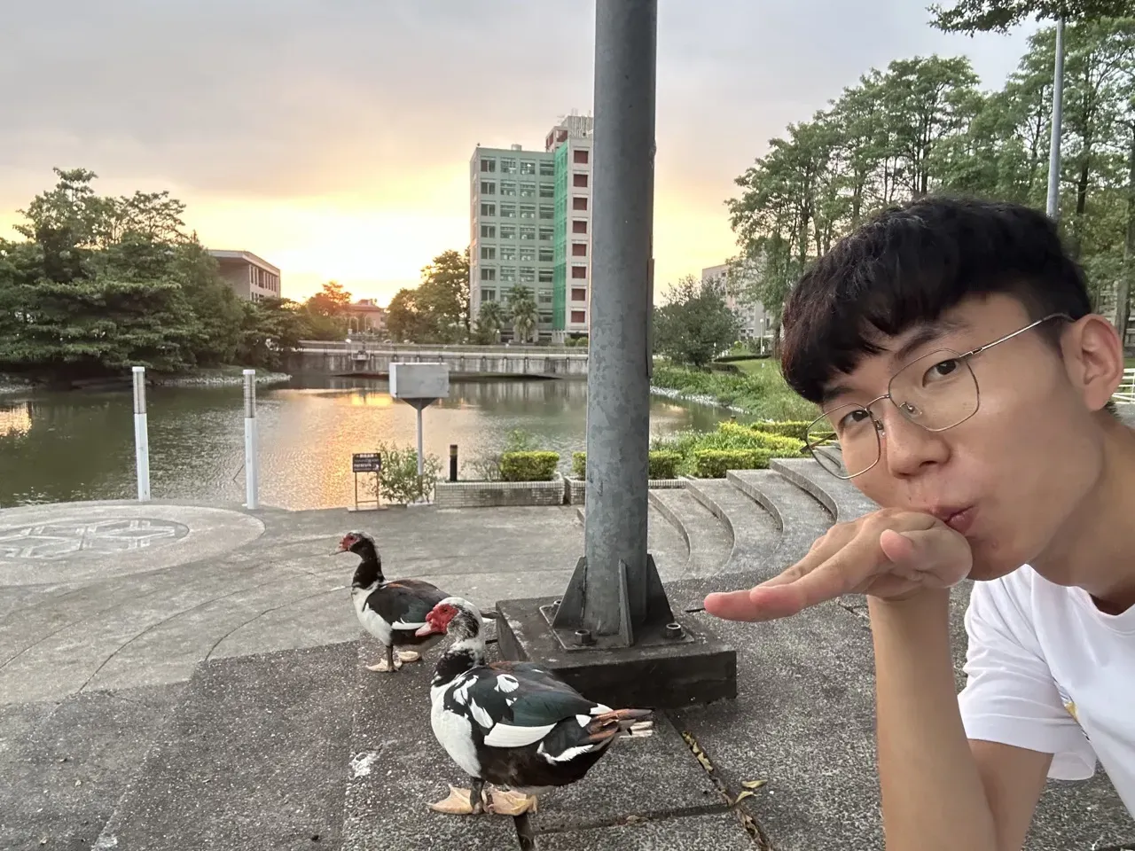 Sam posing with a little duck